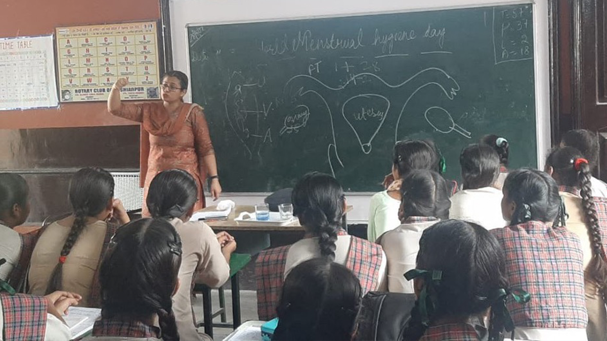 Teacher instructing classroom